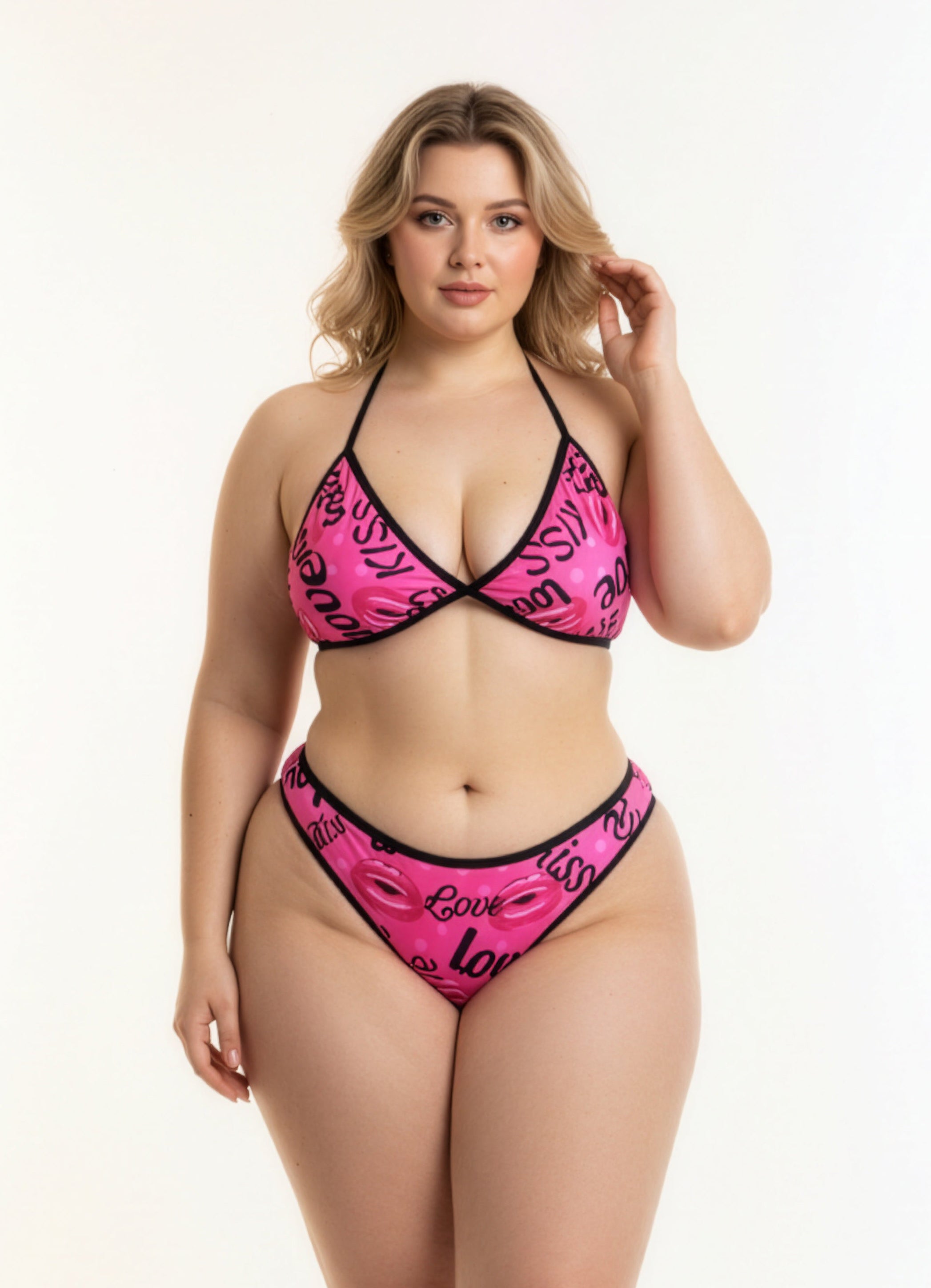 Woman wearing a pink bikini with black accents on a white background