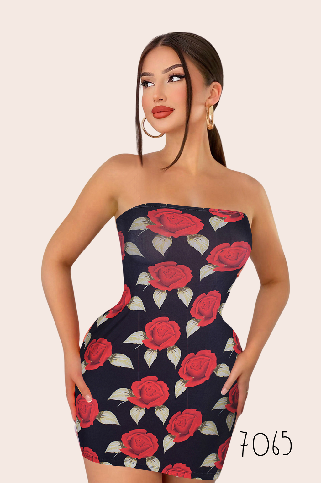 Woman wearing a strapless dress with red rose pattern on a beige background