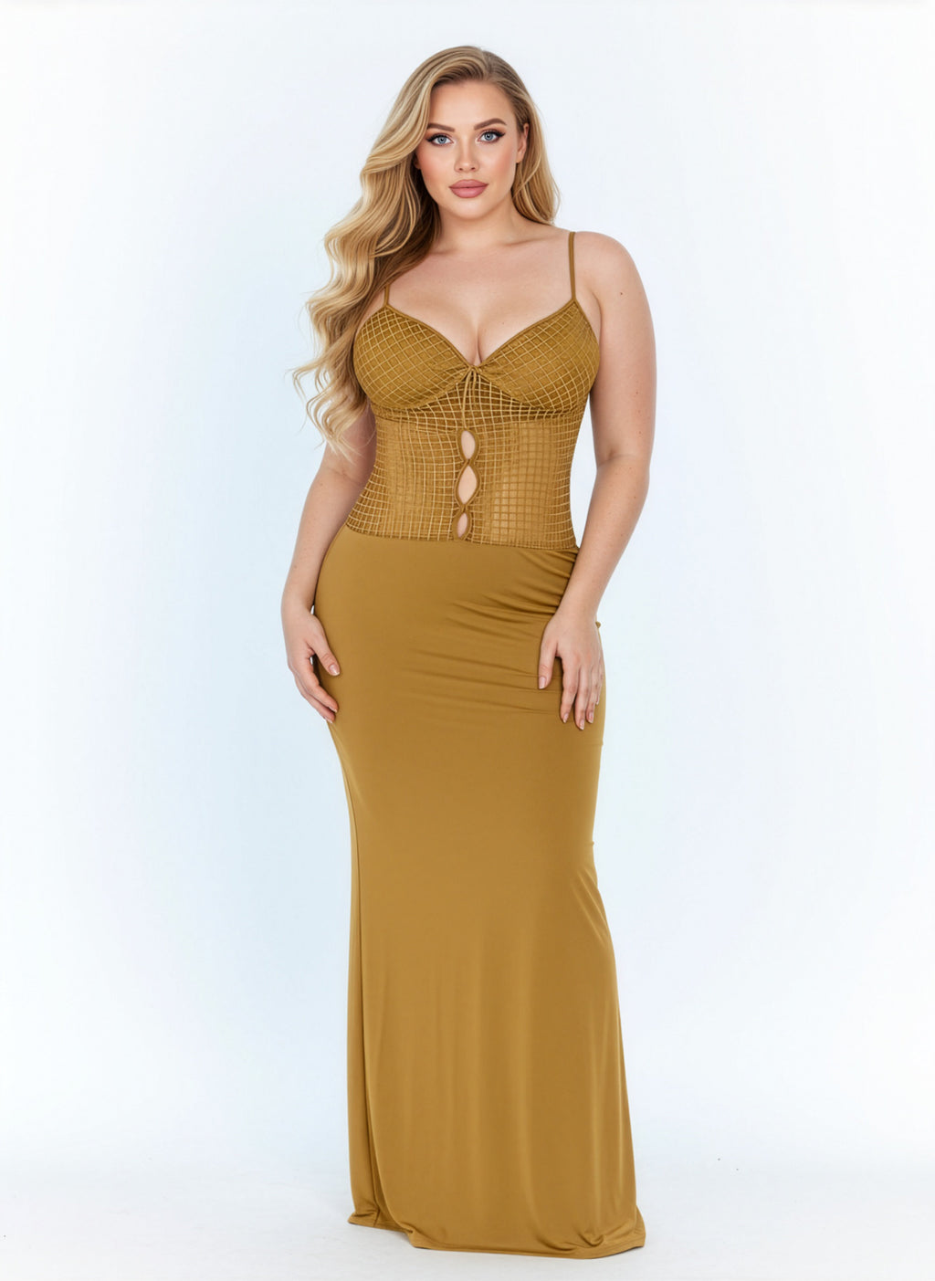 Woman wearing a mustard yellow dress with a fitted bodice and flowing skirt on a white background