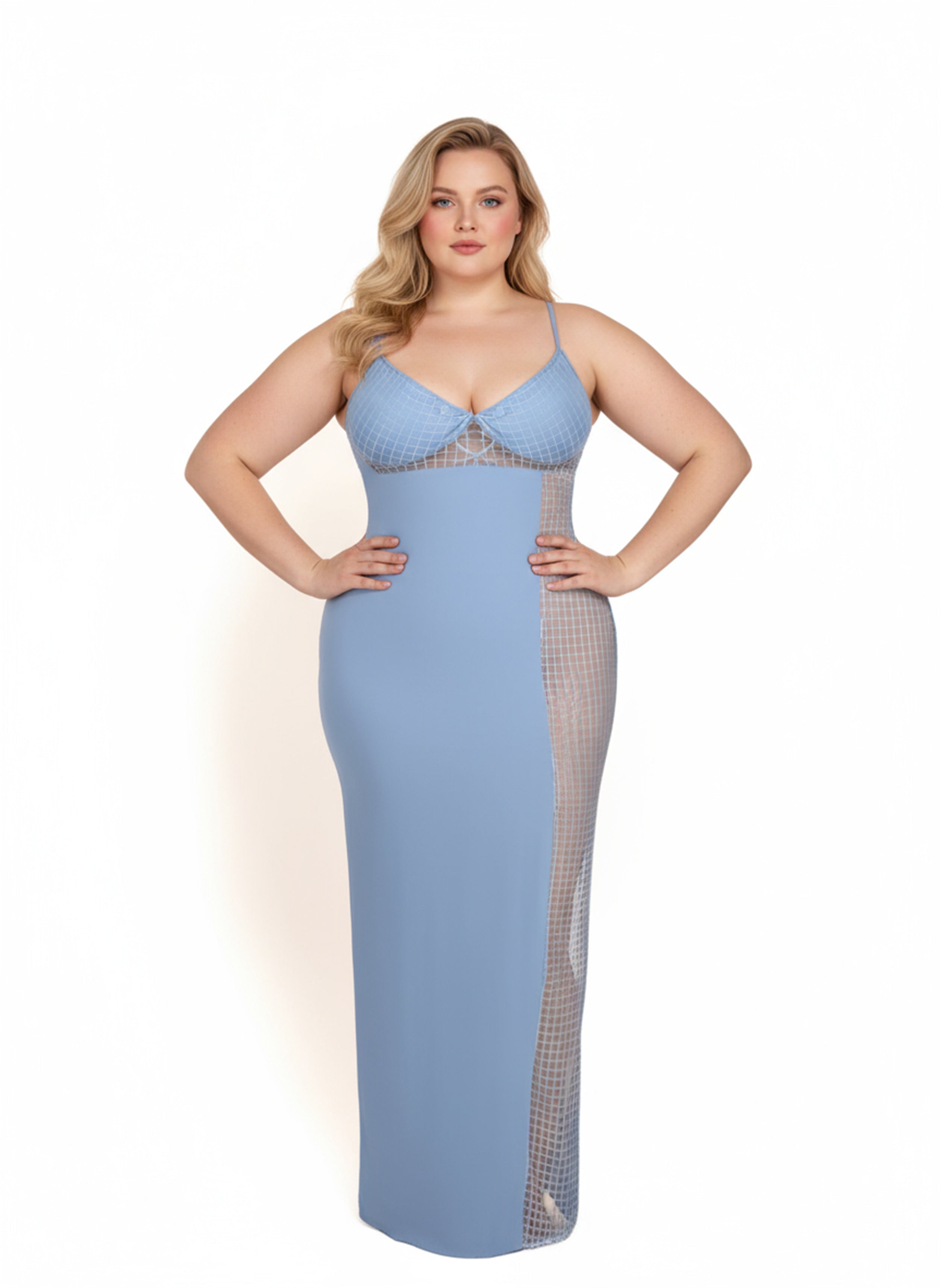 Woman wearing a light blue evening gown with a patterned hem on a white background