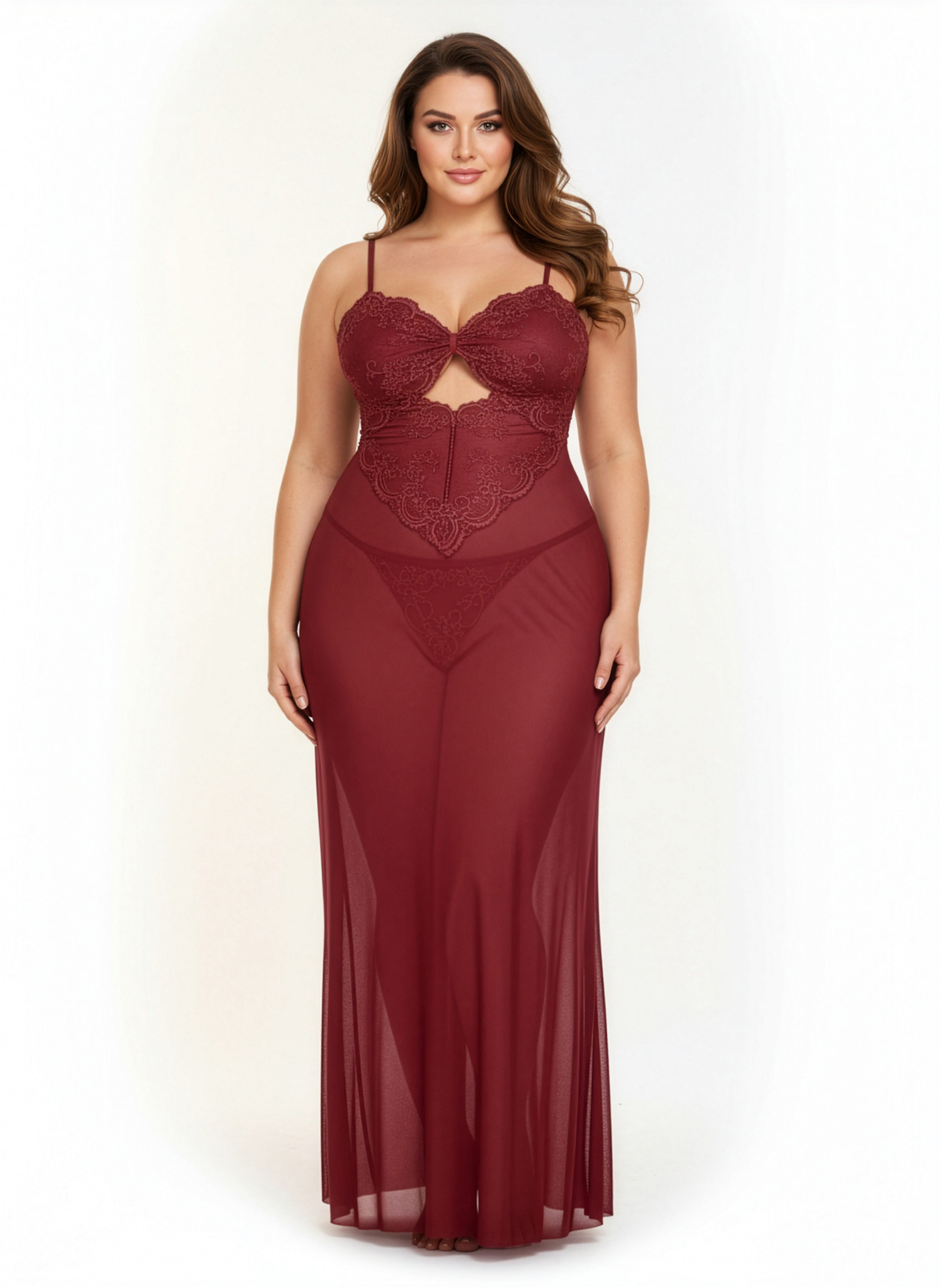 Woman wearing a burgundy evening gown with cut-out design on a white background